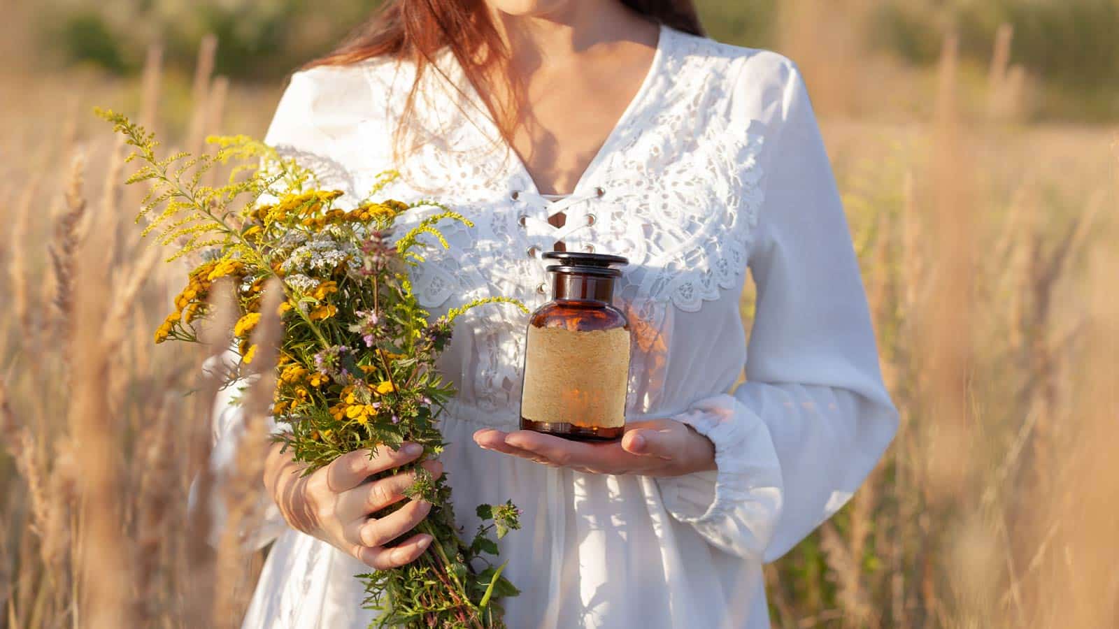 woman herbs field