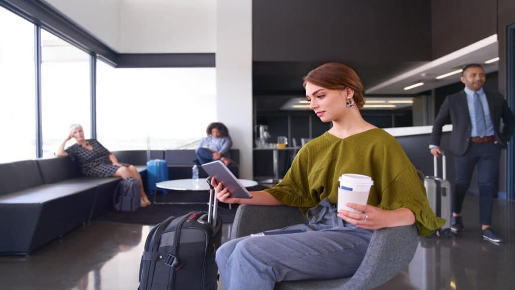 woman reading while waiting