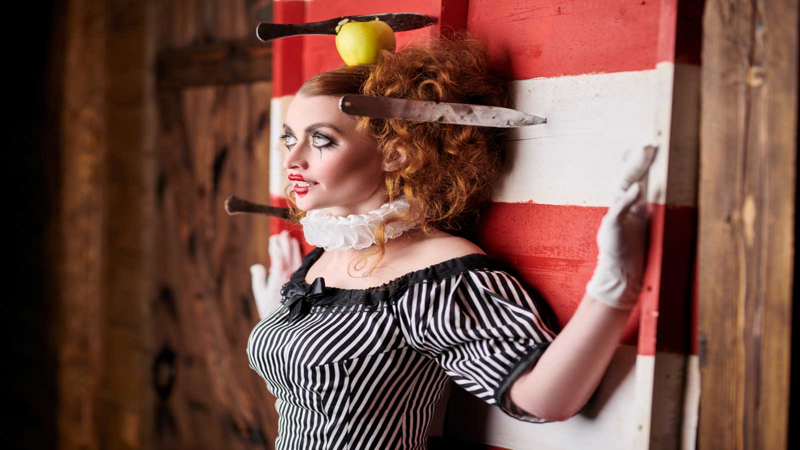 circus performer knife throwing