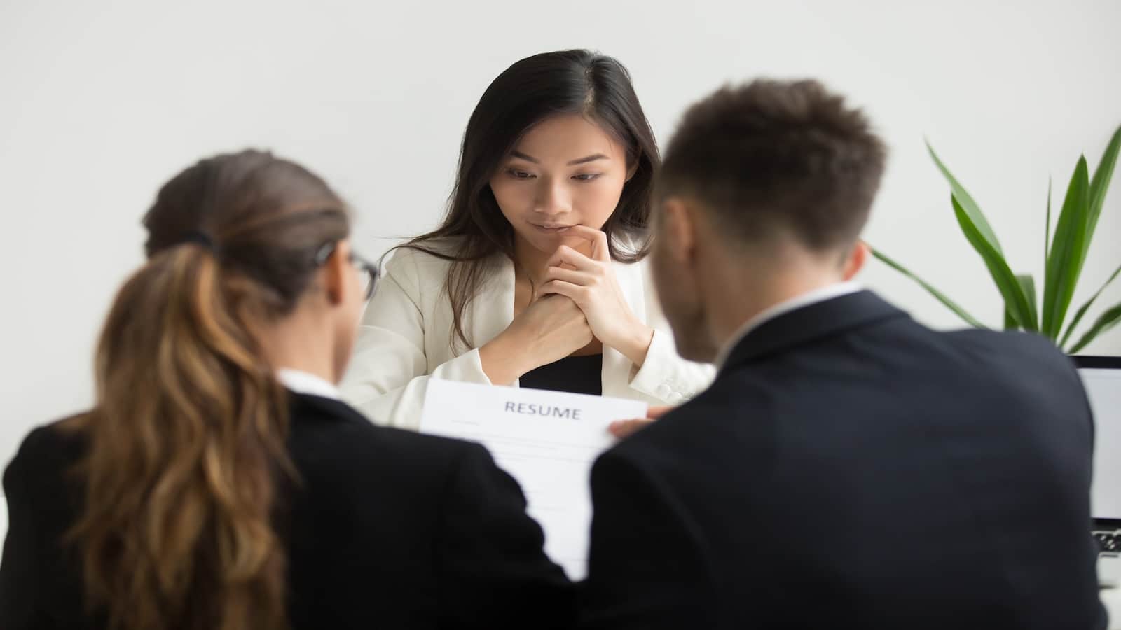 Young woman unhappy at bad job interview.