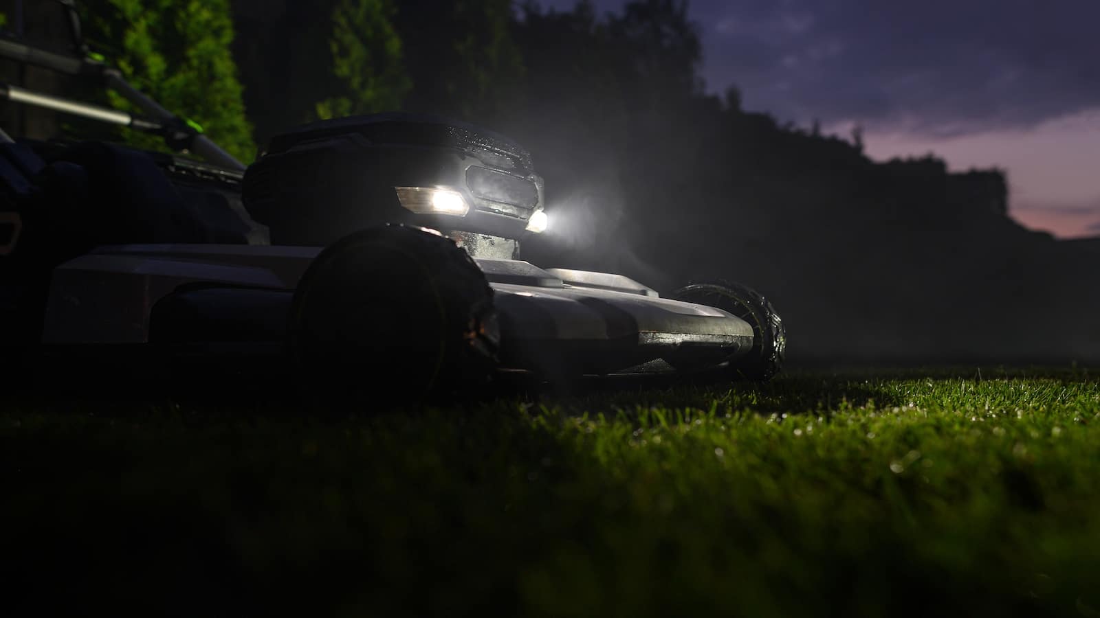 Backyard Grass Mowing During Nighttime.