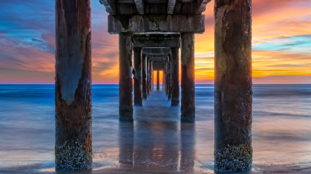 Sunrise Under The St. Johns County Ocean Pier In St. Augustine Florida