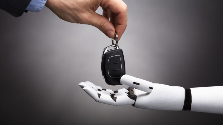 Handing car keys to robot, autonomous driver