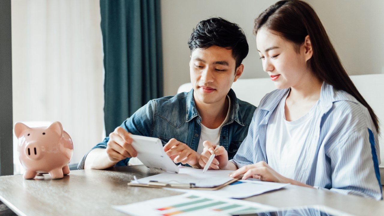 Asian couple researching