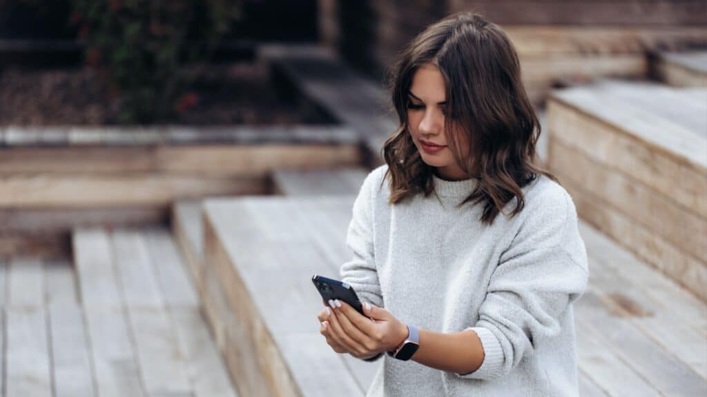Portrait of a Successful Business woman Using iPhone.