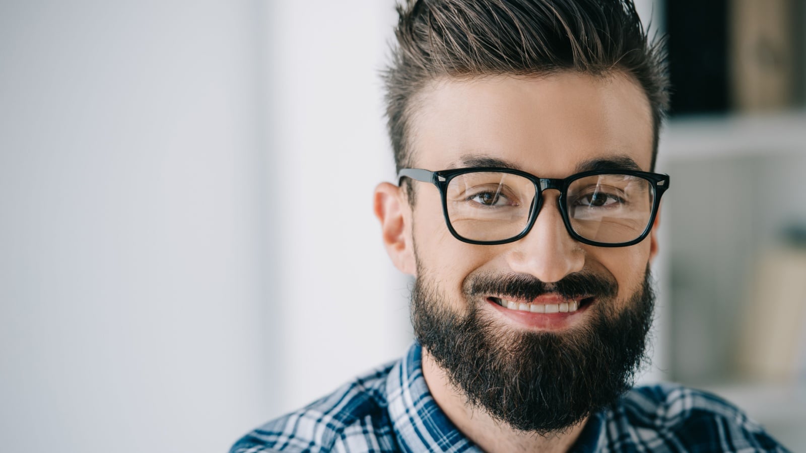 smart young man smiling.