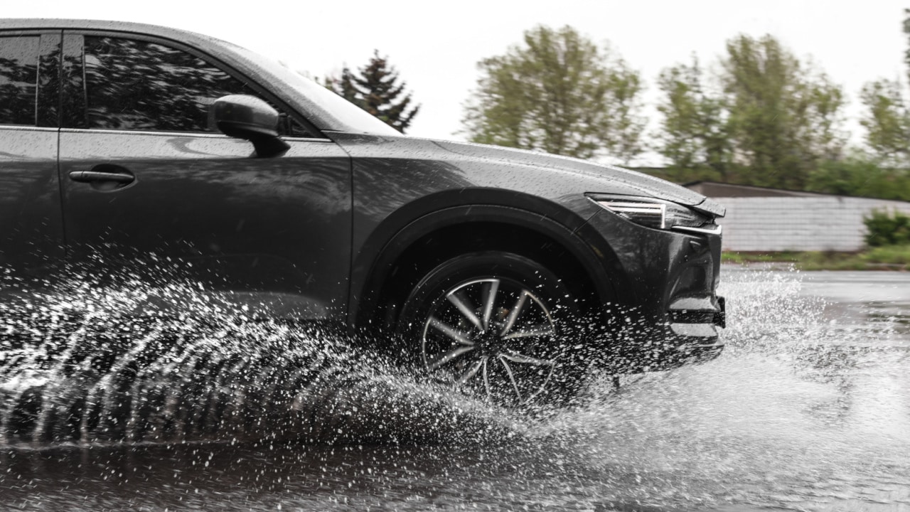 Car driving through water