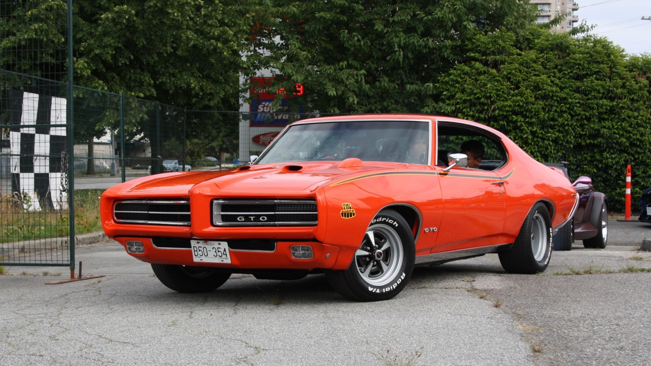 Red Pontiac GTO (1969) car at New Westminster, British Columbia, Canada