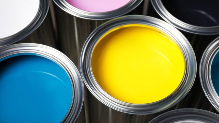 Stock Photo ID: 2274264397 Open cans of different paints as background, closeup