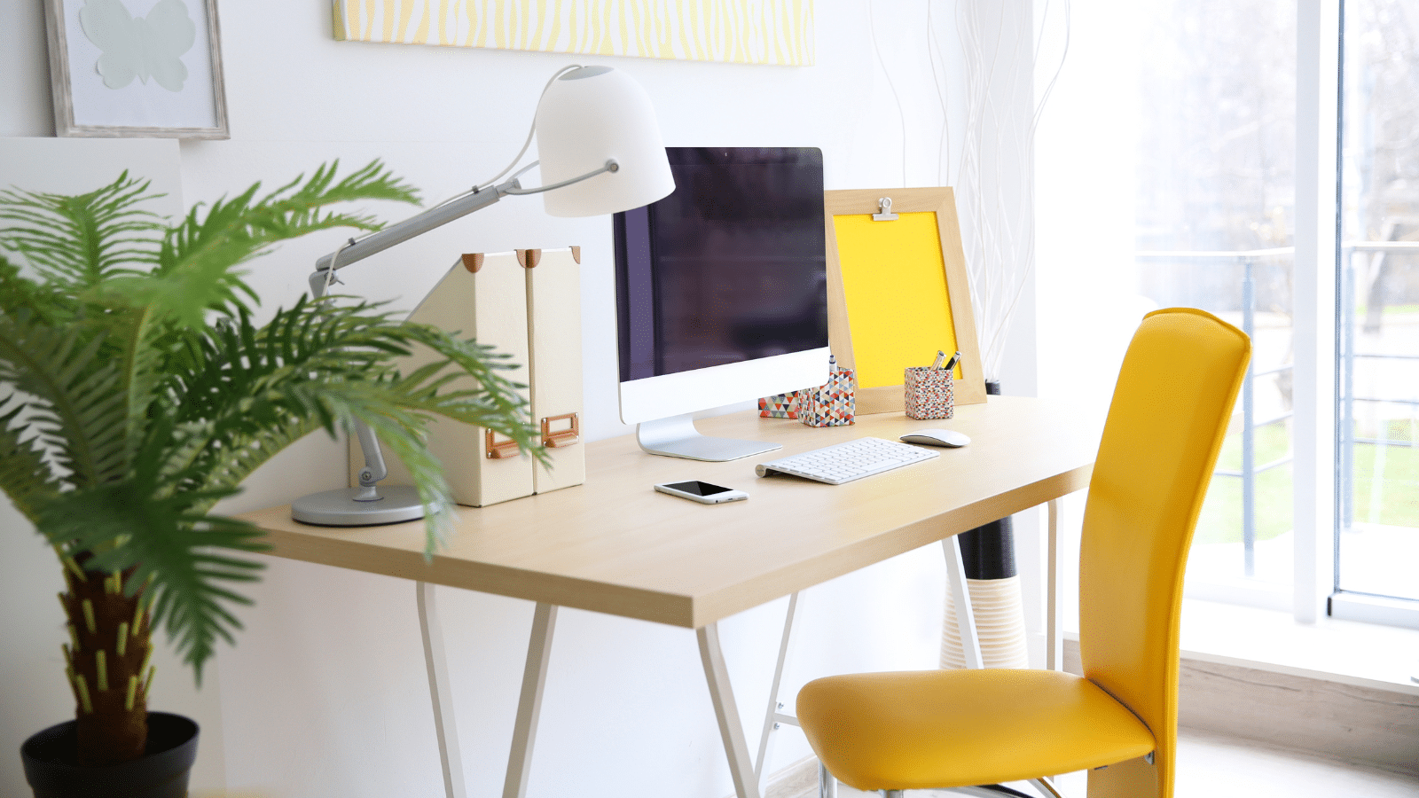 Stylish and colorful workplace with computer at home.