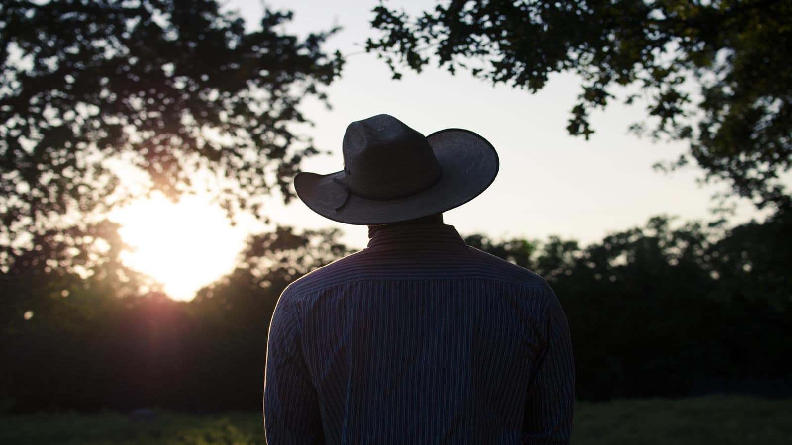 cowboy wearing hat