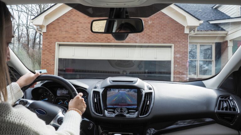 Woman driving car.