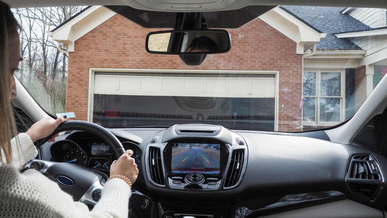 Woman driving car.