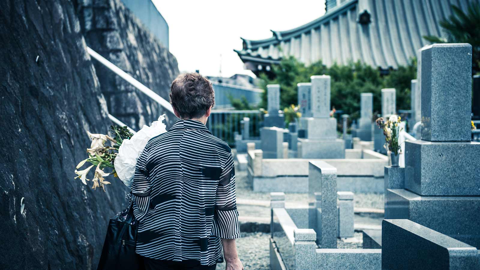 japanese visiting cemetery