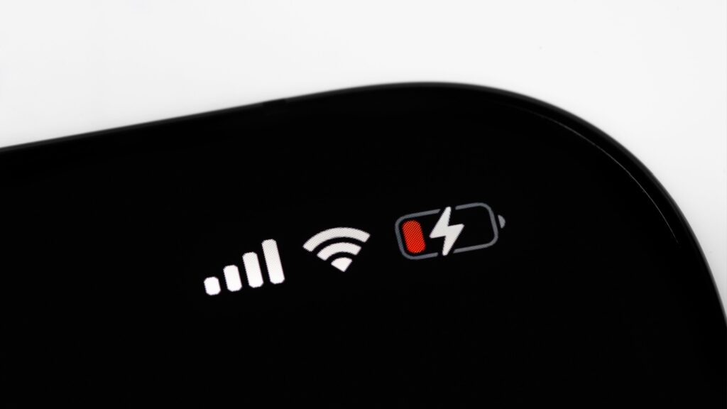 smartphone iPhone with status bar macro Battery health icon, interface on screen iPhone. Apple is a multinational technology company. Moscow, Russia - April 23, 2021.