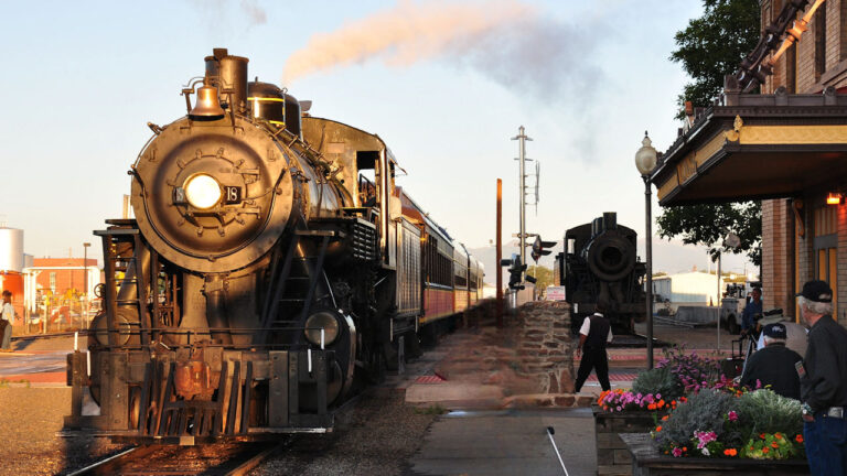 A photo of the Rio Grande Scenic Railroad Engine pulling into a depot