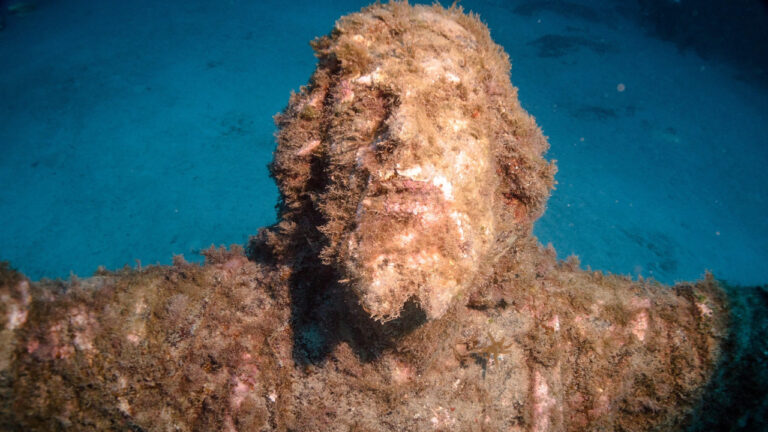 A submerged statue of Jesus Christ, known as Kristu tal-Baħħara (Christ of the Sailors), rests on the seabed two kilometers off the coast of Malta