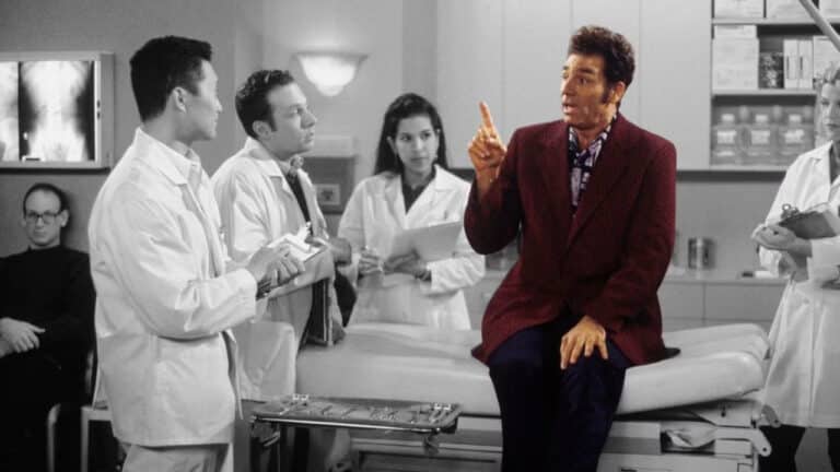 Daniel Dae Kim, Alex Craig Mann, Michael Richards, and Julie Wagner in Seinfeld (1989) - Cosmo Kramer is in color, while background characters are black and white.