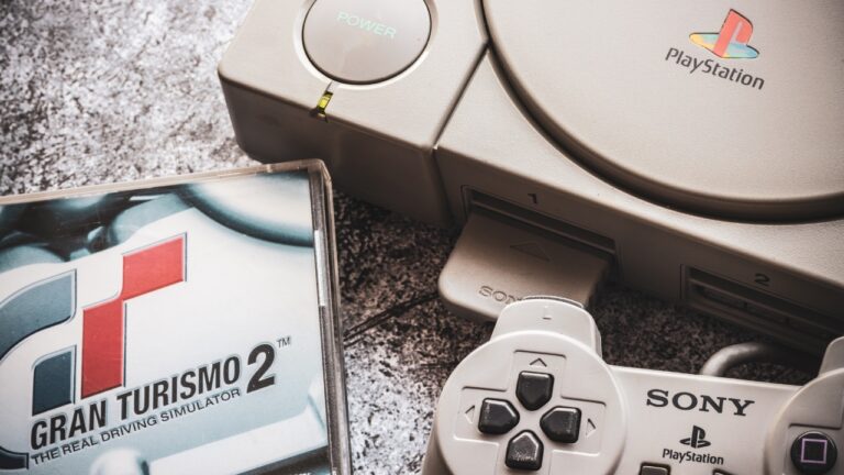 Old PlayStation console by Sony Entertainment. Illustrative, editorial.