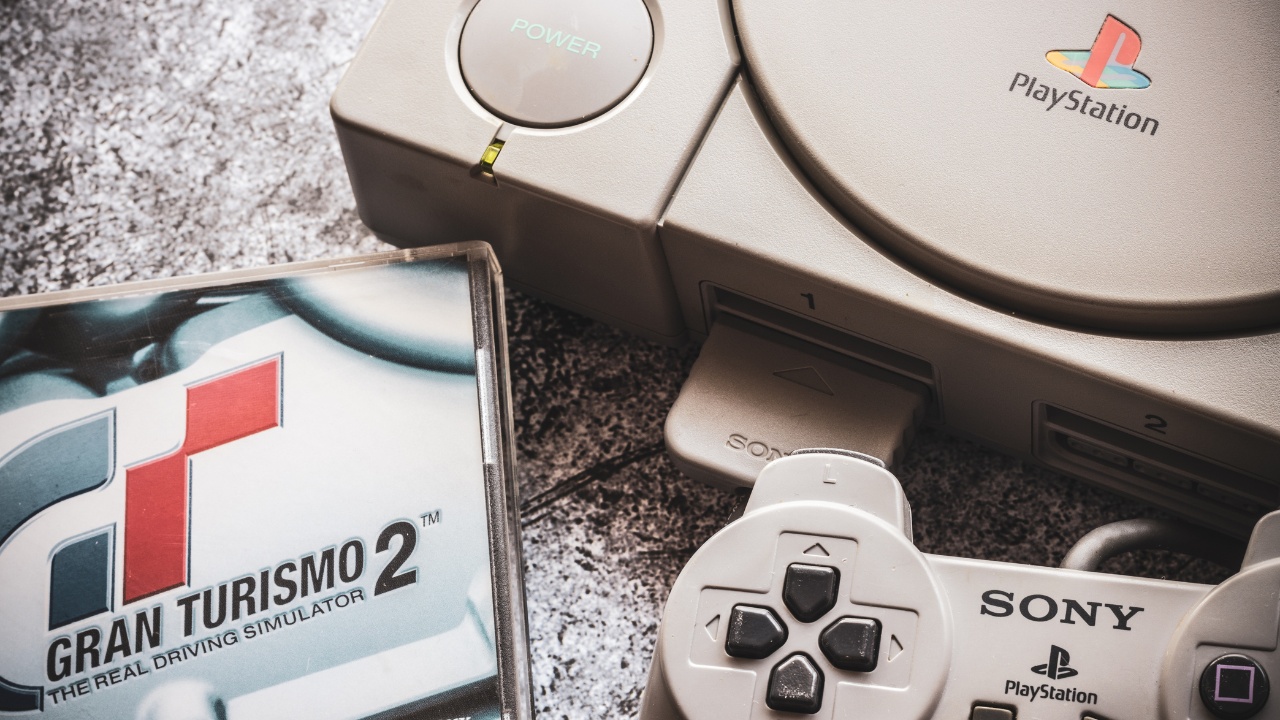 Old PlayStation console by Sony Entertainment. Illustrative, editorial.
