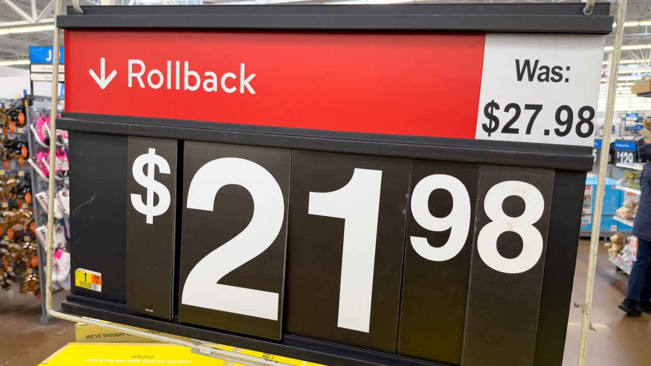 Walmart Rollback sign above a discount rack inside a store.