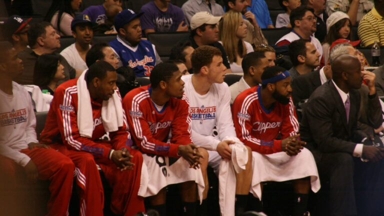 Los Angeles Clippers players and assistant coach Robert Pack on the bench in 2011