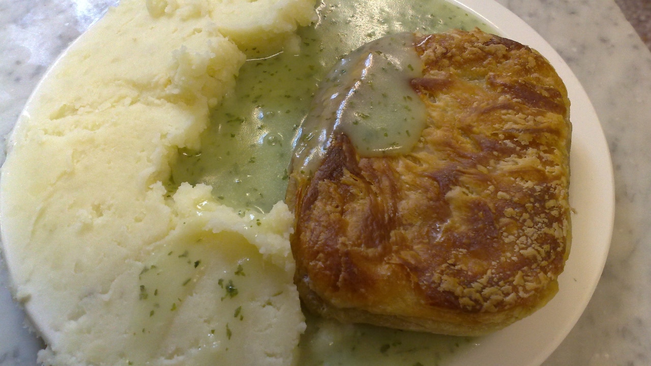 Pie and mash with liquor sauce in a London restaurant