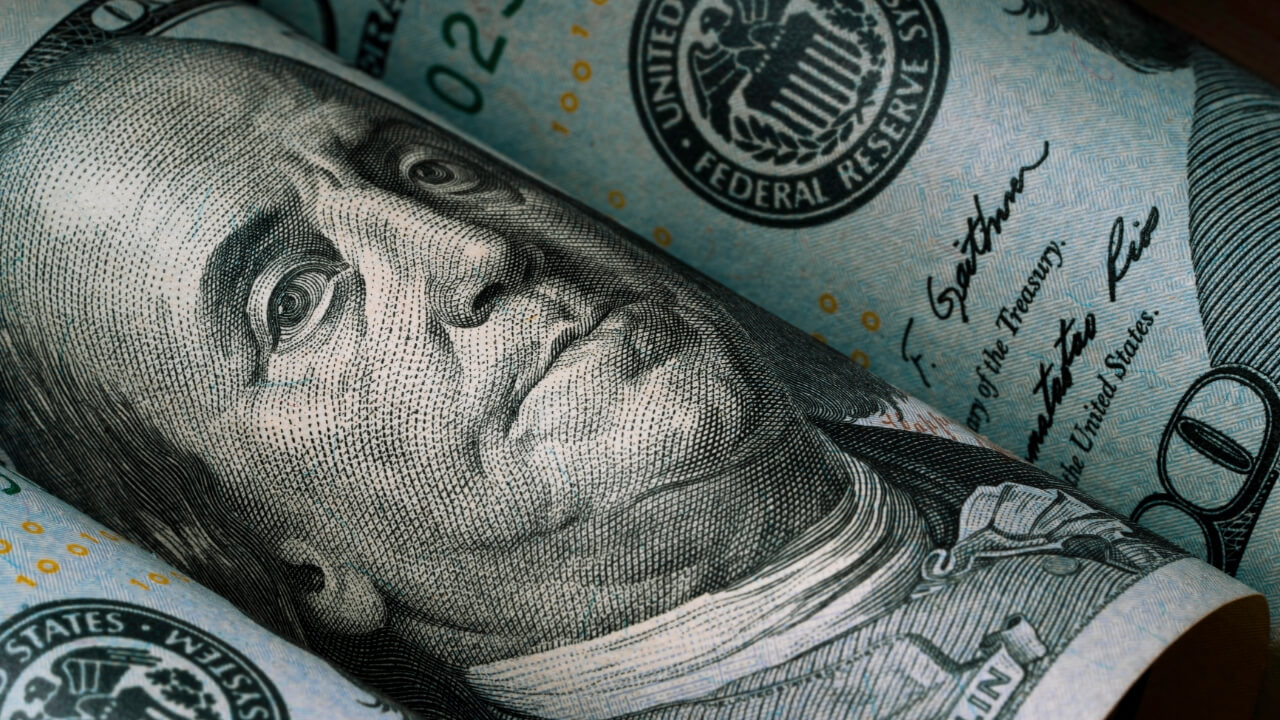 Close up of Benjamin Franklin on 100 dollar bill