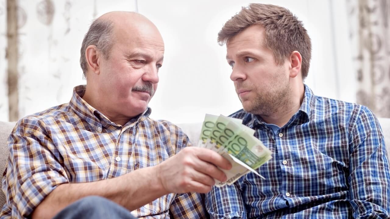 Father loaning money to his son, financial problems, bills, loan, give, money, cash