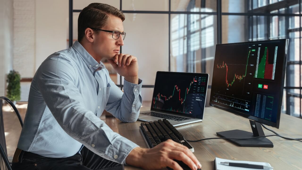 Man analyzing stock market, graphs, charts, thinking, business, broker, money, investor, invest