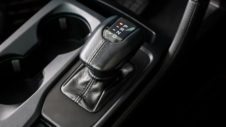A gear shifter in a manual transmission vehicle