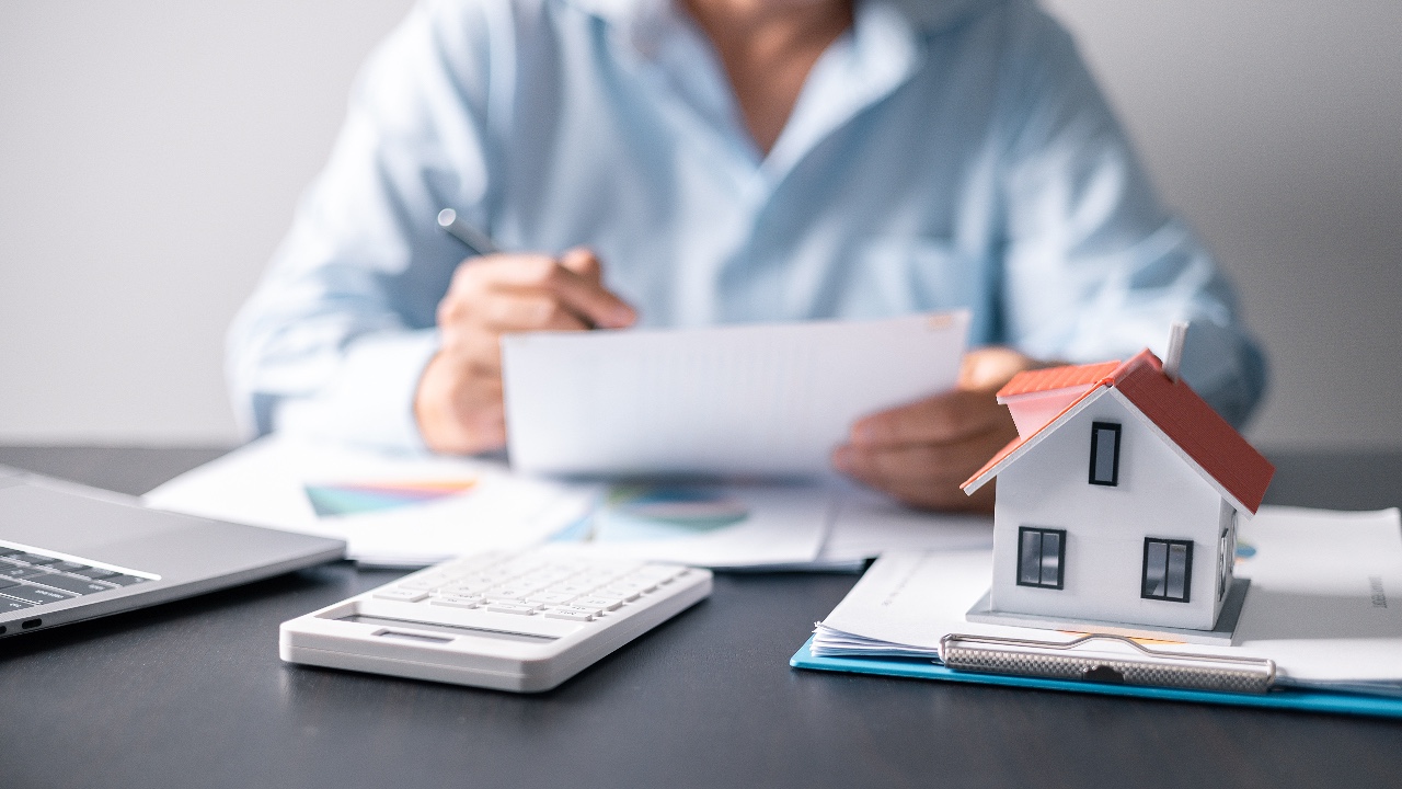 House with money. Concept of finance or refinance real estate.