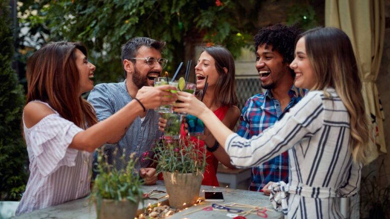 friends sharing cocktails