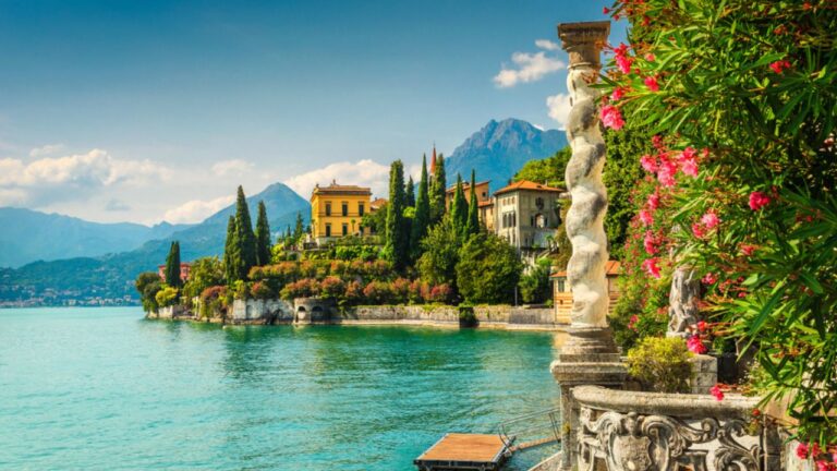 Famous luxury villa Monastero, stunning botanical garden decorated with mediterranean oleander flowers, lake Como, Varenna, Lombardy region, Italy, Europe