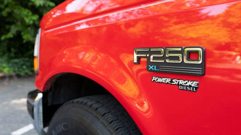 1996 Red Ford F250 XL Power Stroke Diesel 4x4 American off-road pickup truck exterior.