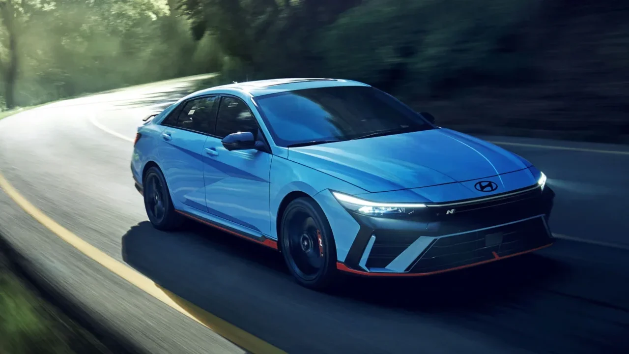 Blue 2025 Hyundai Elantra N driving.