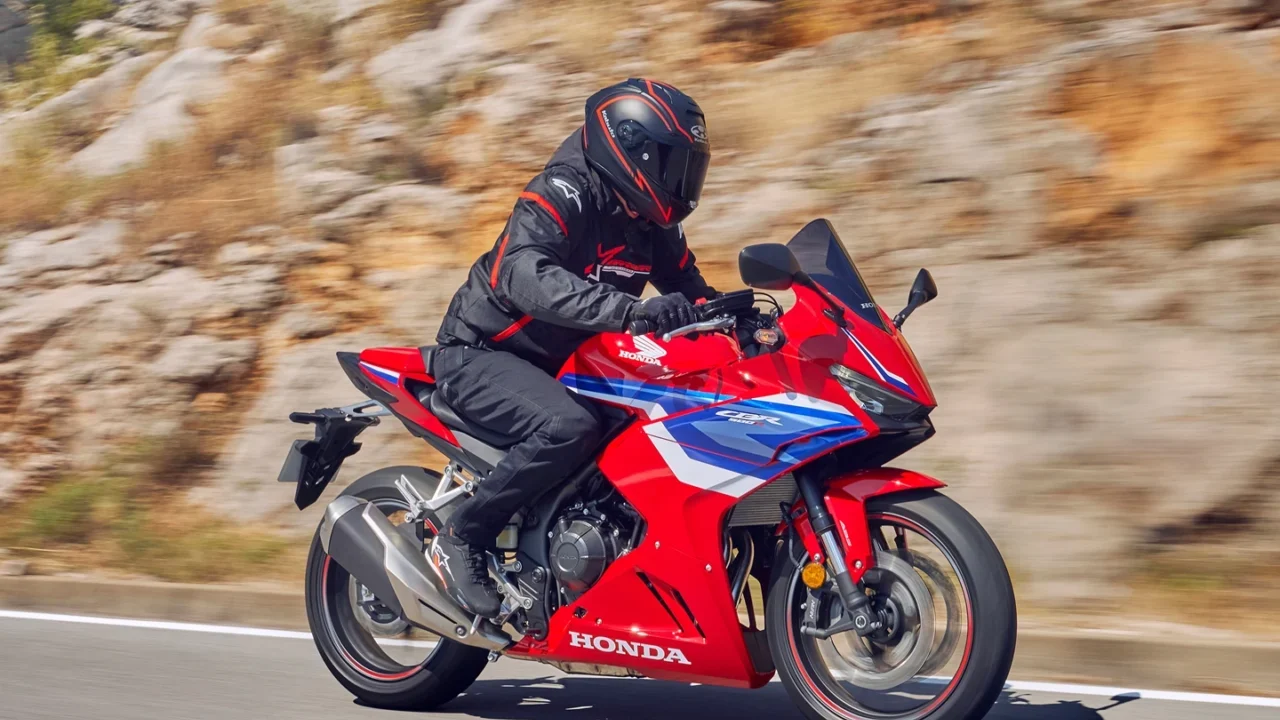 Red Honda CBR500R on the road