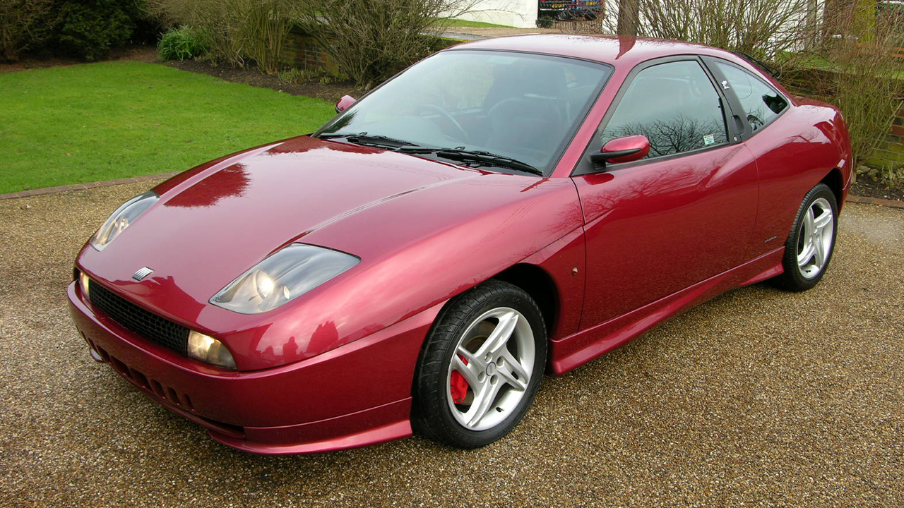 Fiat Coupe, front 3/4 view, dark red exterior