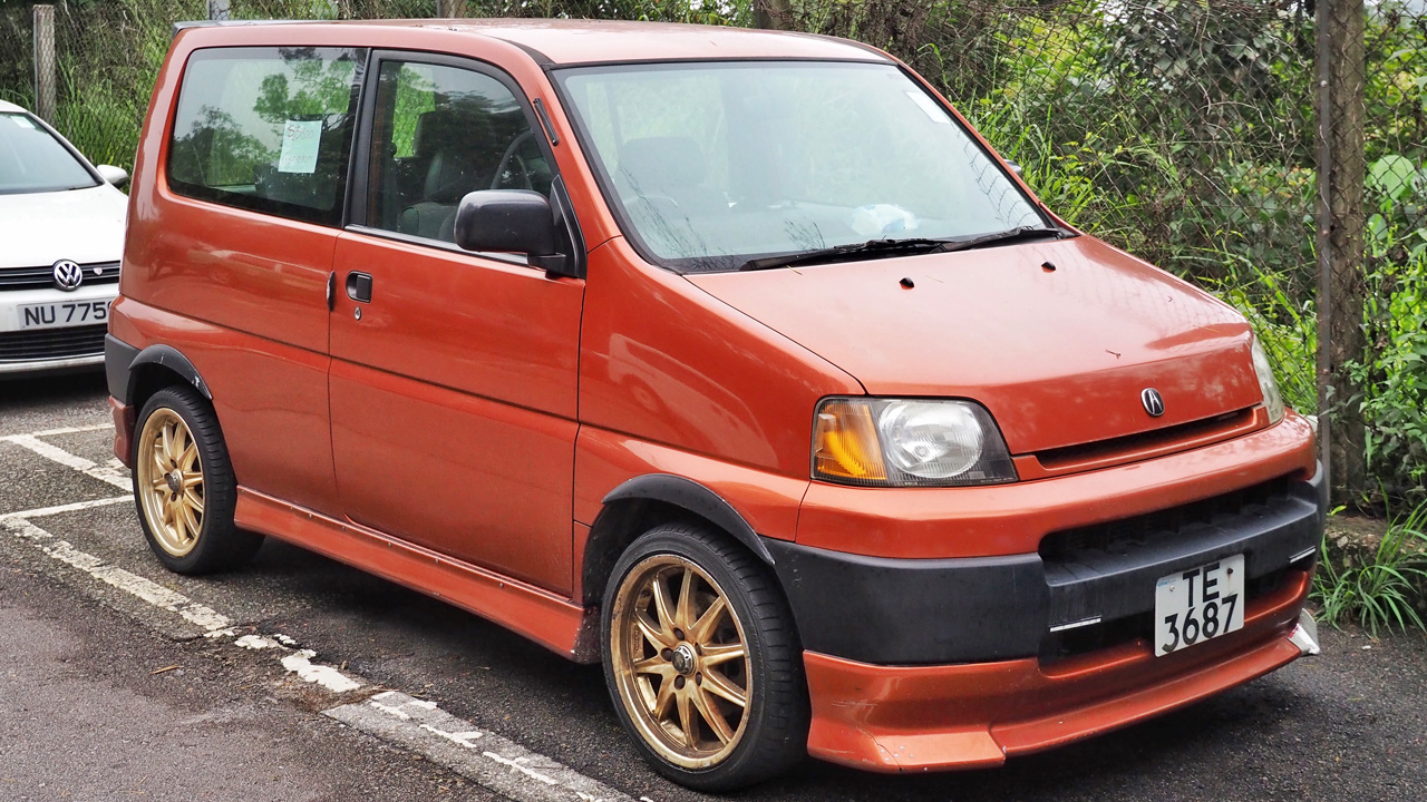Honda S-MX, front 3/4 view, orange exterior, aftermarket wheels