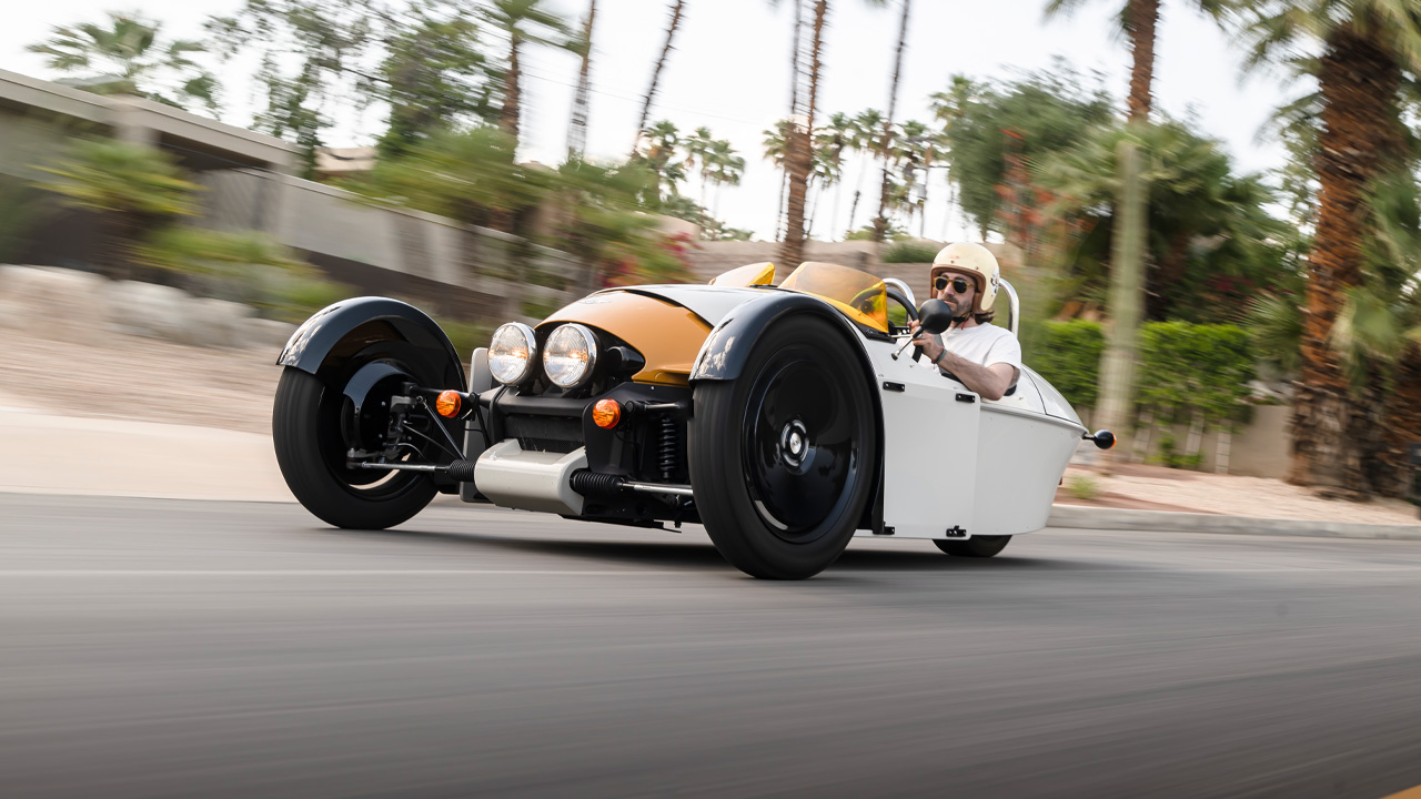 Morgan Super 3, front 3/4 view, driving, white exterior