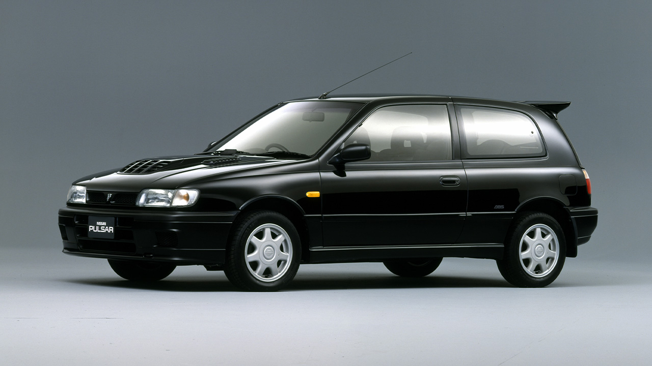 Nissan Pulsar GTI-R, front 3/4 view, black exterior, studio shot
