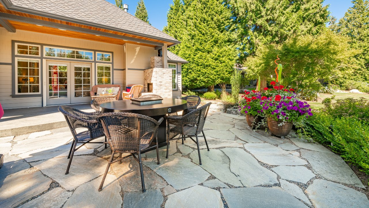 Patio deck terrace balcony lanai and sun decks with beautiful blue skies ocean views colorful furnishings patio furniture staging decor and sunshine. 