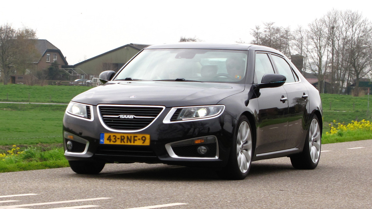 Saab 9-5, front 3/4 view, driving, black exterior