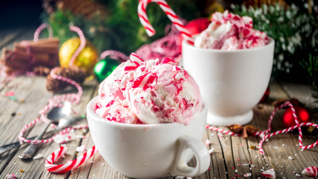 Christmas dessert, Homemade Peppermint Candy Cane Ice Cream in two cups, old wooden background with xmas decorations