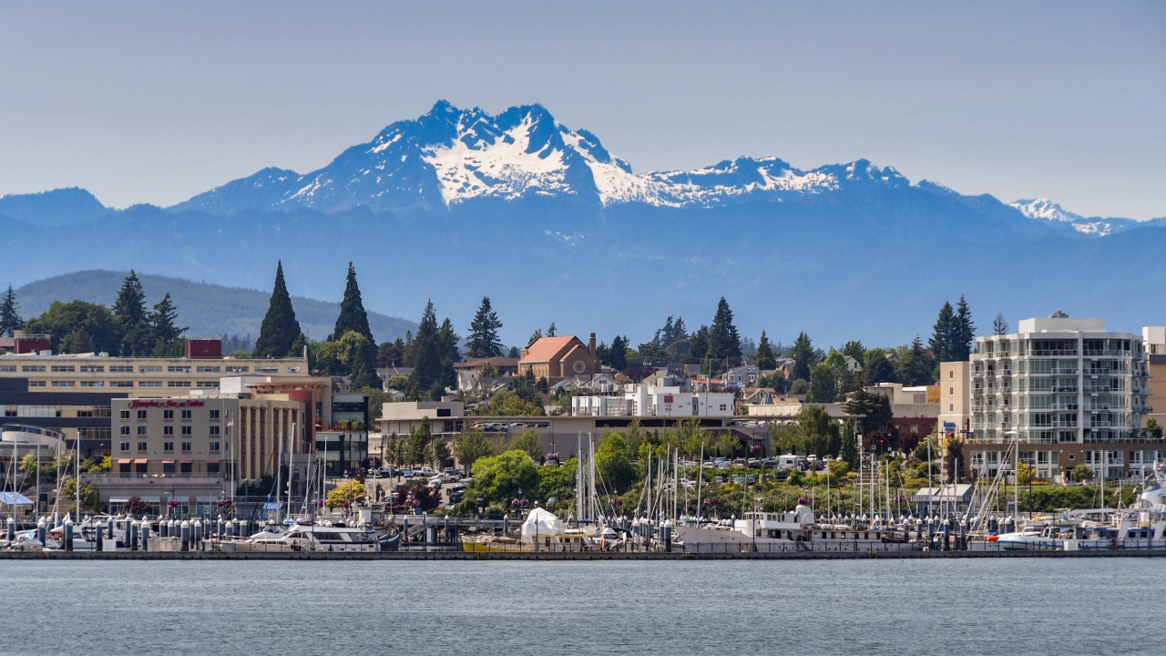 Bremerton, Washington, with a backdrop of snow cappped mountains.