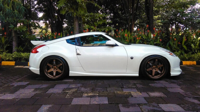 White Nissan 370Z parked on the front of a hotel Surakarta Indonesia February 2nd 2020