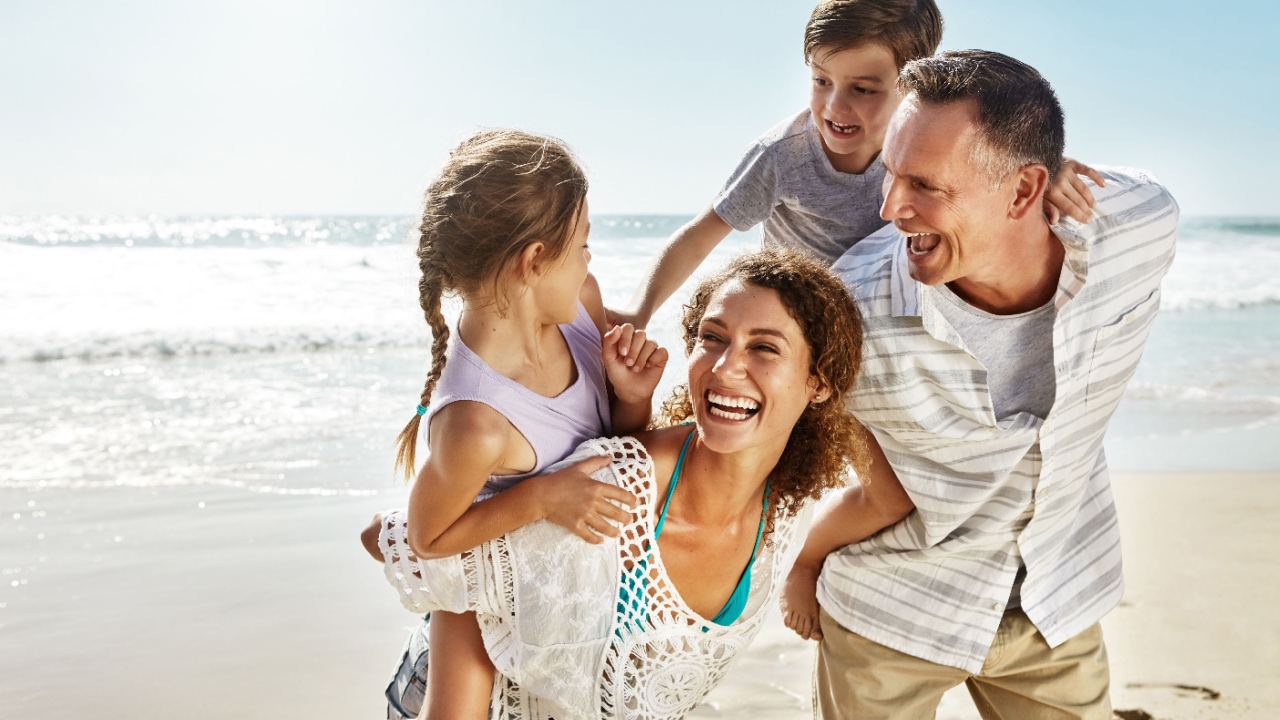 Family on a beach in Miami, Florida.