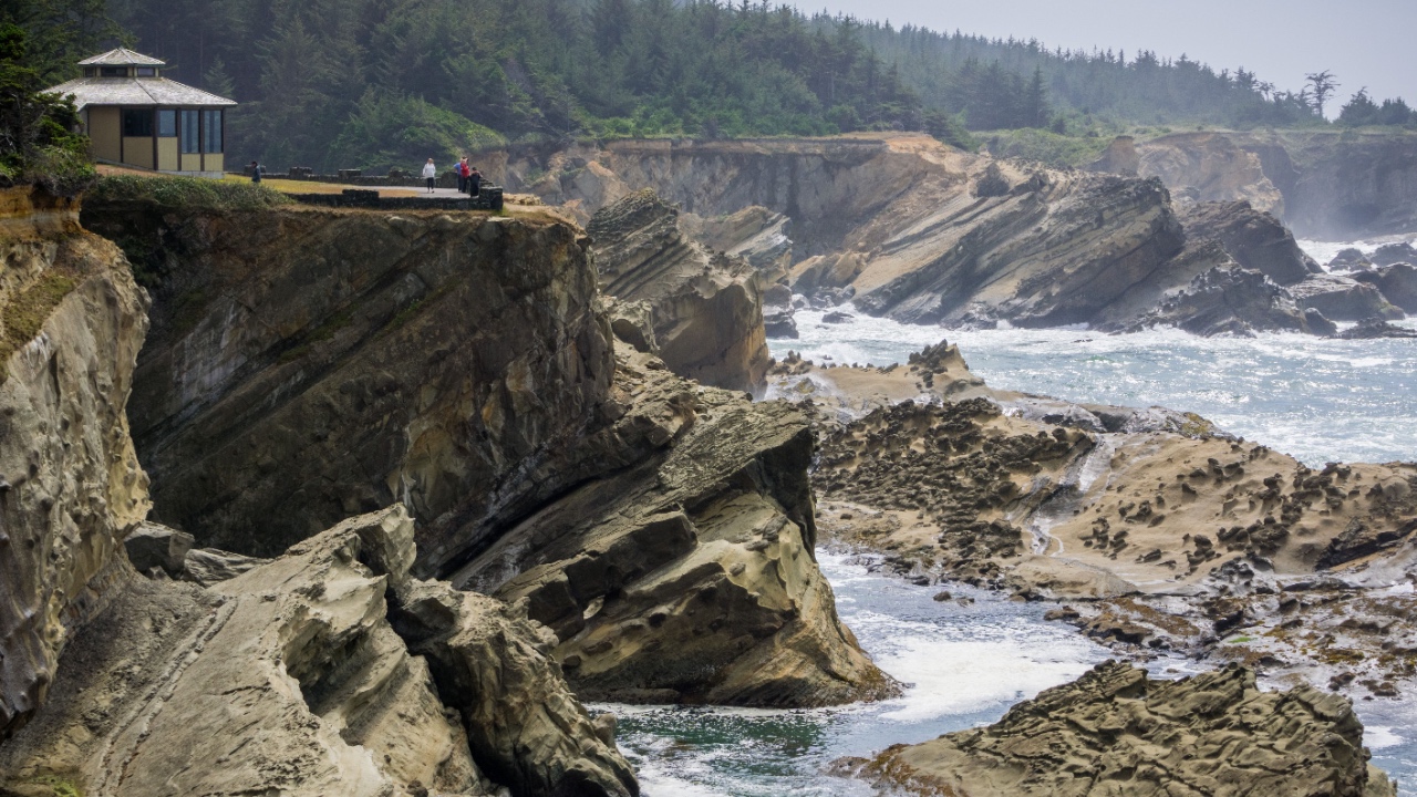 Dramatic shoreline with strange rock formations at Shore Acres State Park, Coos Bay, Oregon