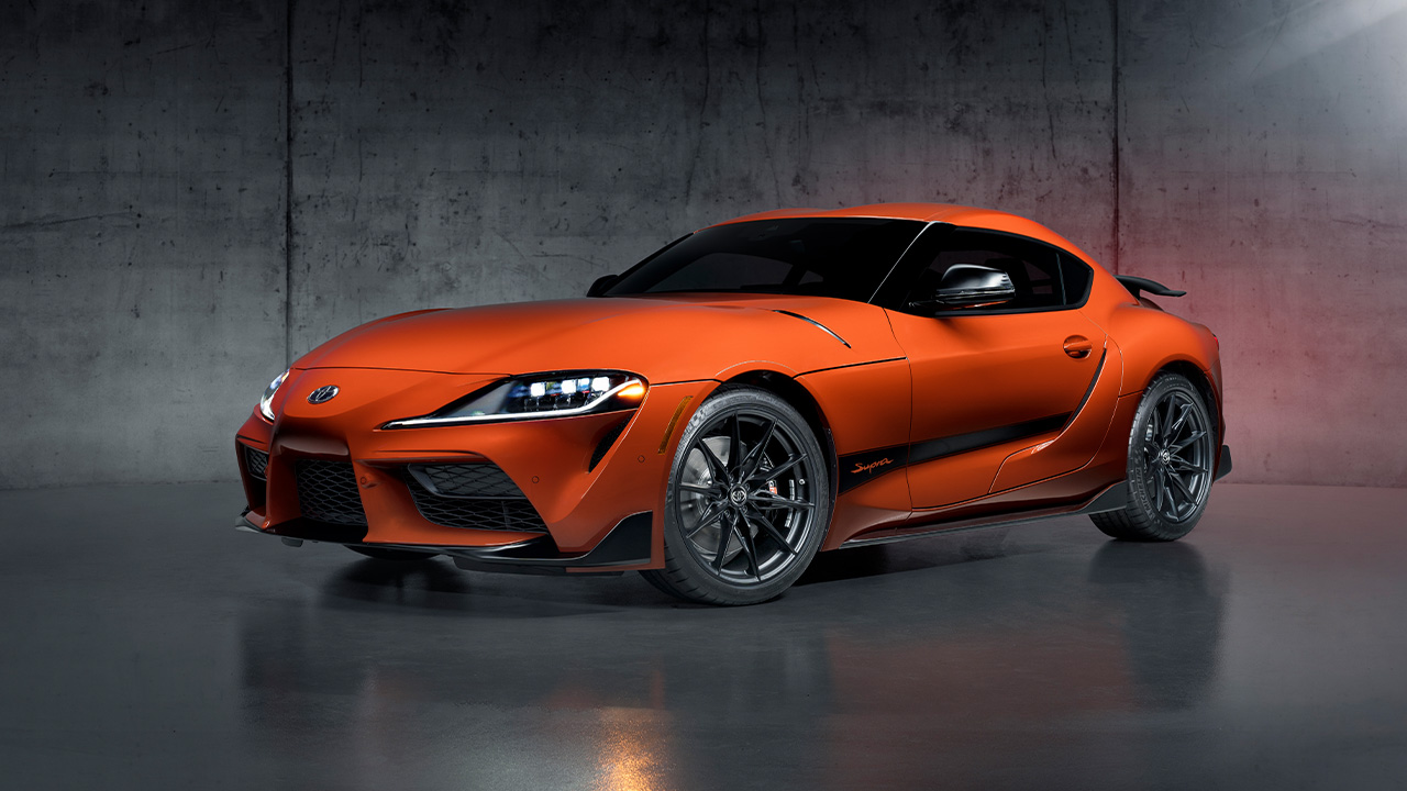 Toyota GR Supra, 45th Anniversary Edition, front 3/4 view, studio shot, orange exterior