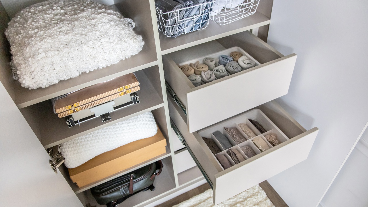Top-down open door view of a woman's organized closet.